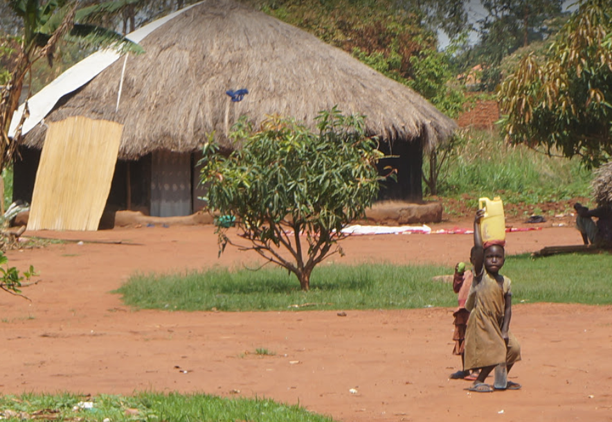 Boy carring water in Gulu, Uganda, March 2018
