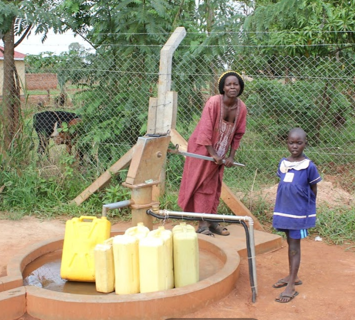Woman at well in Gulu, Uganda, March 2018